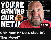 A YouTube Title Card. Surly looking bald man frowns into the camera. Bold white text "YOU'RE QRM'ING OUR NET!!" Subtitle: "QRM From HF Nets. Shouldn't They Move??"