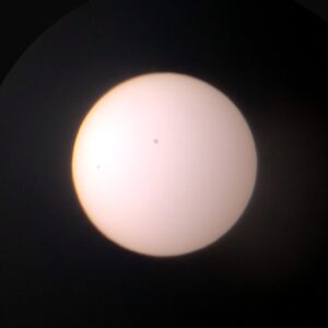 Shot with the Hestia and iPhone (and Gravity app) prior to the beginning of the eclipse, shows the clearest view I could get of a big sunspot just above center and a hair left.