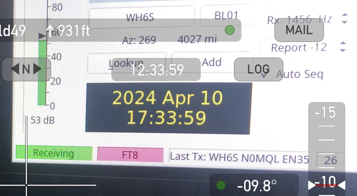 Screenshot of the Theodolite app wherein I've set Theodolite's clock-with-seconds display right over the iPhone's camera view of WSJT-x's clock-with-seconds display. This allows me to watch them drift apart.